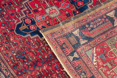 Four oriental rugs, a.o. Tabriz, Sarouk and Hamadan/Nahavand rugs with floral and geometric design, wool and cotton, 20th C.