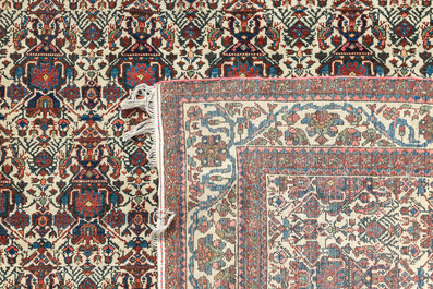 Four oriental rugs, a.o. Tabriz, Sarouk and Hamadan/Nahavand rugs with floral and geometric design, wool and cotton, 20th C.