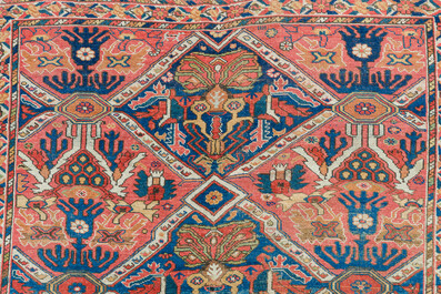 An Azerbaijani rug with geometric design, wool on cotton, 20th C.