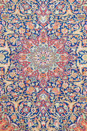 A Persian Sarouk rug with floral design, wool on cotton, 20th C.