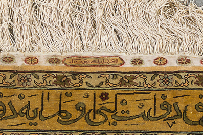 Three oriental silk rugs with hunting scenes and floral design, Hereke, Qom (Qum/Ghom) and Kashmir, 20th C.