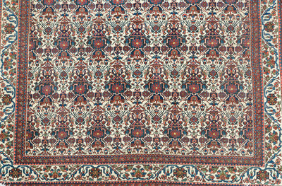 Four oriental rugs, a.o. Tabriz, Sarouk and Hamadan/Nahavand rugs with floral and geometric design, wool and cotton, 20th C.