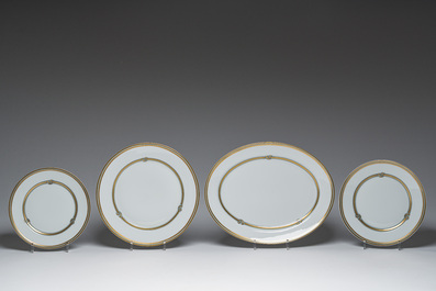 A French 50-piece polychrome and gilt porcelain 'Ruban or' service, Christofle, 20th C.