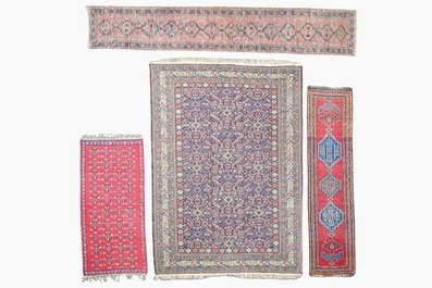 Four oriental rugs, a.o. a Persian Shirvan rug and an Azerbaijani runner with geometric design, wool on cotton, 20th C.