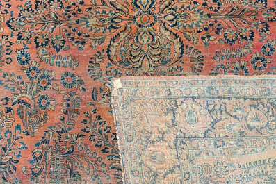 A Persian American Sarouk rug with floral design, wool on cotton, 20th C.