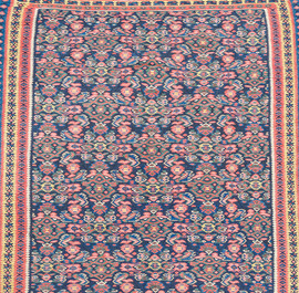 A Persian Senneh Kelim (Kilim) rug with floral design, wool on cotton, 20th C.