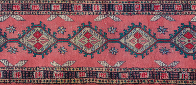 Four oriental rugs, a.o. a Persian Shirvan rug and an Azerbaijani runner with geometric design, wool on cotton, 20th C.