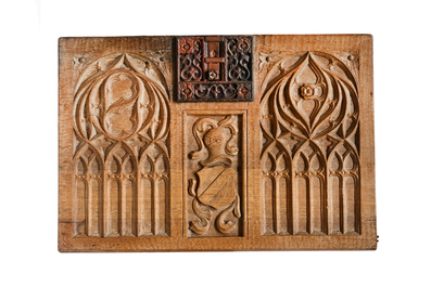 A Belgian or French oak Gothic Revival 'armorial' panel, 19th C.