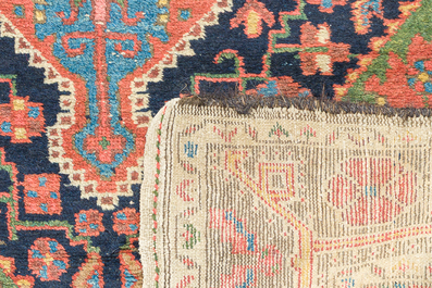 Three oriental rugs with floral design, Tabriz, Sarouk and Hamadan, wool on cotton, 20th C.