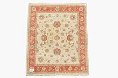 An Afghan Ziegler rug with floral design, wool on cotton, 20th C.