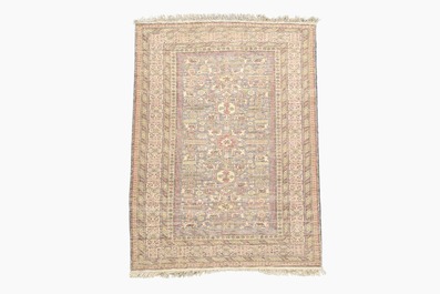 A Caucasian rug with geometric design, wool on cotton, 20th C.