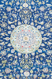 A Persian Keshan (Kashan) rug with floral design, wool on cotton, 20th C.