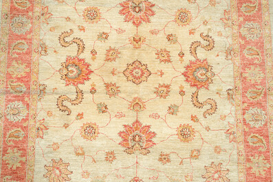 An Afghan Ziegler rug with floral design, wool on cotton, 20th C.