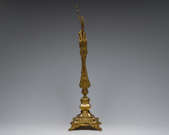 A large French gilt bronze monstrance decorated with cherubs amidst radiant clouds and set with glass stones, ca. 1900