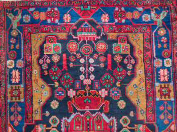 Four oriental rugs, a.o. Tabriz, Sarouk and Hamadan/Nahavand rugs with floral and geometric design, wool and cotton, 20th C.