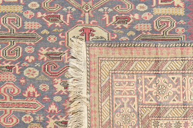 A Caucasian rug with geometric design, wool on cotton, 20th C.