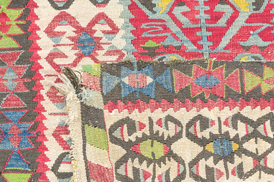 Four oriental carpets, a.o. three Turkish Kelim (Kilim) rugs with geometric design, wool on cotton, 20th C.