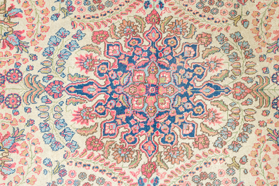 Three oriental rugs with floral design, Tabriz, Sarouk and Hamadan, wool on cotton, 20th C.