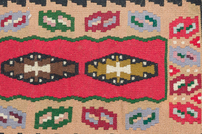 Four oriental carpets, a.o. three Turkish Kelim (Kilim) rugs with geometric design, wool on cotton, 20th C.