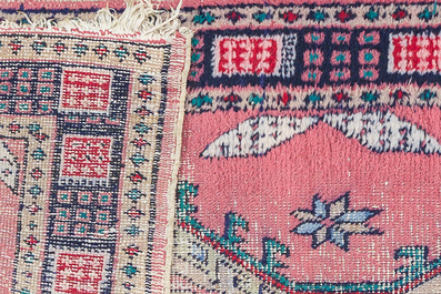 Four oriental rugs, a.o. a Persian Shirvan rug and an Azerbaijani runner with geometric design, wool on cotton, 20th C.