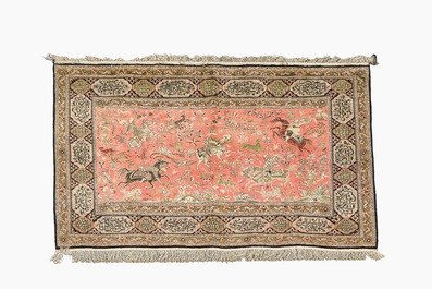 Three oriental silk rugs with hunting scenes and floral design, Hereke, Qom (Qum/Ghom) and Kashmir, 20th C.