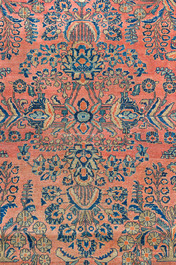 A Persian Sarouk rug with floral design, wool on cotton, first half 20th C.