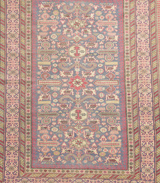 A Caucasian rug with geometric design, wool on cotton, 20th C.
