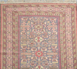A Caucasian rug with geometric design, wool on cotton, 20th C.