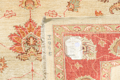 An Afghan Ziegler rug with floral design, wool on cotton, 20th C.