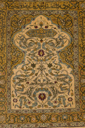Three oriental silk rugs with hunting scenes and floral design, Hereke, Qom (Qum/Ghom) and Kashmir, 20th C.