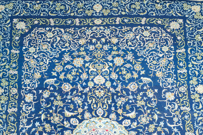A Persian Keshan (Kashan) rug with floral design, wool on cotton, 20th C.