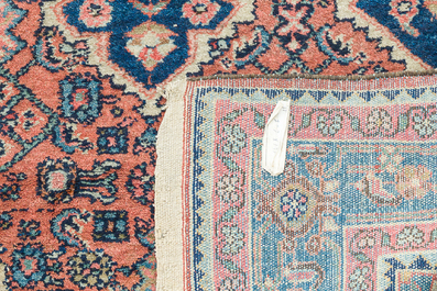 Three oriental rugs with floral design, Tabriz, Sarouk and Hamadan, wool on cotton, 20th C.