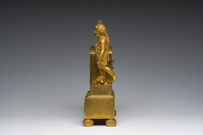 A Ghent gilt bronze mantel clock crowned with a male Bacchante, 19th C.