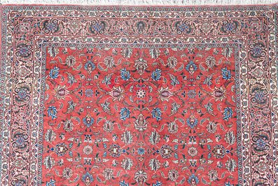 A Persian Tabriz rug with floral design, wool, cotton and silk, 20th C.