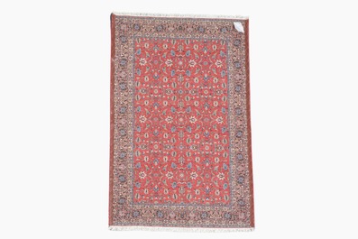 A Persian Tabriz rug with floral design, wool, cotton and silk, 20th C.