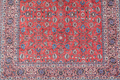 A Persian Tabriz rug with floral design, wool, cotton and silk, 20th C.