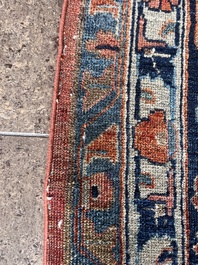 A Persian Sarouk rug with floral design, wool on cotton, first half 20th C.