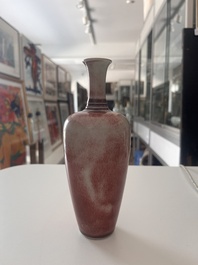 A Chinese monochrome peachbloom-glazed vase, Kangxi mark, 19th/20th C.