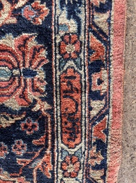 A Persian Sarouk rug with floral design, wool on cotton, first half 20th C.