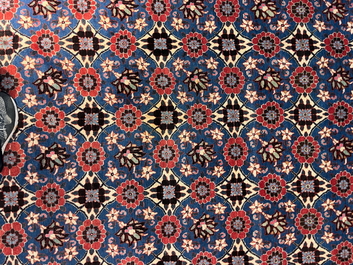A Persian Varamin rug with floral design, wool on cotton, mid 20th C.