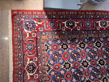 A Persian Varamin rug with floral design, wool on cotton, mid 20th C.