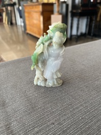 Two Chinese turquoise figures of Lan Caihe and a jade lady figure, 20th C.