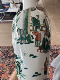 A Chinese famille verte vase with Immortals and their servants in a palace garden, Kangxi mark, 19th C.