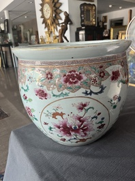 A Chinese famille rose jardini&egrave;re with floral design on a wooden base, 19th C.