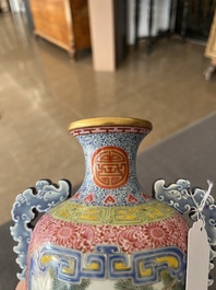 A Chinese falangcai vase with birds among blossoming branches, Qianlong mark, 20th C.