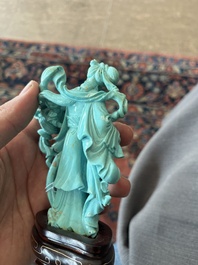 Two Chinese turquoise figures of Lan Caihe and a jade lady figure, 20th C.