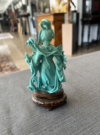 Two Chinese turquoise figures of Lan Caihe and a jade lady figure, 20th C.