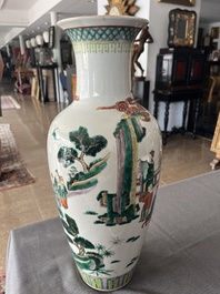 A Chinese famille verte vase with Immortals and their servants in a palace garden, Kangxi mark, 19th C.