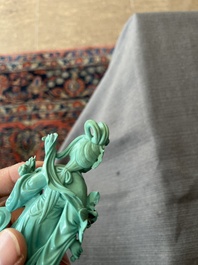 Two Chinese turquoise figures of Lan Caihe and a jade lady figure, 20th C.