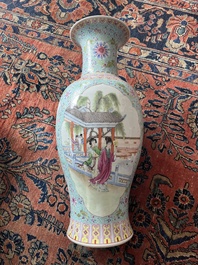 A Chinese famille rose baluster vase with court ladies relaxing in a palace garden, Qianlong mark, Republic, 20th C.